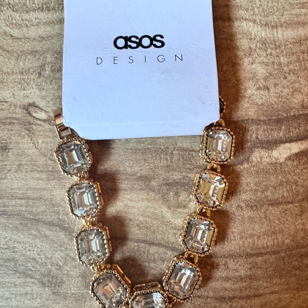 ASOS DESIGN faux crystal chain link bracelet in gold tone